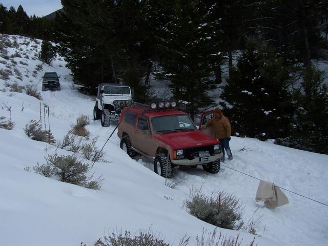 Brian and Joe had to daisy chain to get enough weight to pull the truck around and out of the hole.