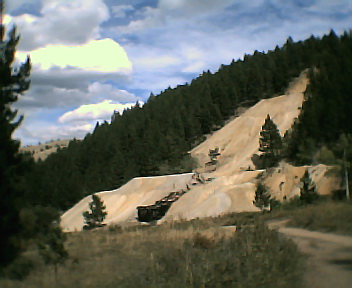 We finally hiked up to the top of this to see what was there, great view, big hole. More pics of this ride to come when I get th