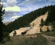We finally hiked up to the top of this to see what was there, great view, big hole. More pics of this ride to come when I get th