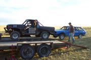 Chris Brown's Bronco gets helped onto the trailer by Howard's Suby