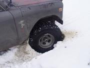 Tom made some holes - here the Scout is halfway Hi-Lifted out.