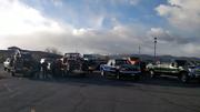 The non-Jeeps trailered - Rob Currier, Mike Kelly, Tom Mandera, Don Gordon (L-R) with a Chevota, Bronco, Scout, and Bronco