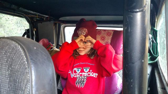 Audrey insists on flashing another gang sign