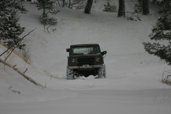 Tom driving up the hill to bring Michelle, the photographer, back down since she was waiting up top while Mike and Brian got stu
