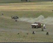 Tyler running, while Blair pulls his Bronco down to let Tom Mandera take a spin