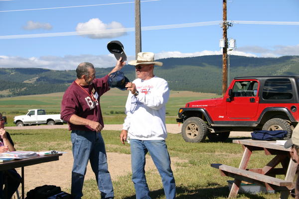Ron Walker trades his Dee Motors hat for an Old Fart Racing Team hat.