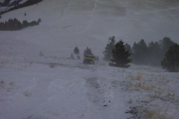 Todd attempts to make it to the top, while the wind blows snow around us.