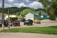 Chris Lamping in his Explorer and Dennis Lietzow arrives in his F250 Ranger