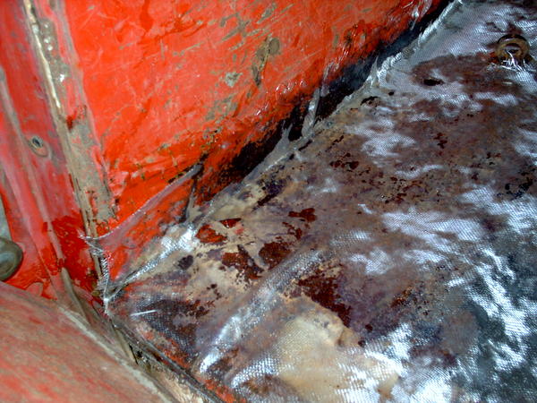 Fiberglass is carried up the wheel well a couple inches.