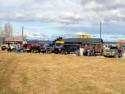 P3300013 - Getting the group together at The Grub-Stake.
7 rigs in all for this run.
Dennis LaTulip in the white Blazer is &qu