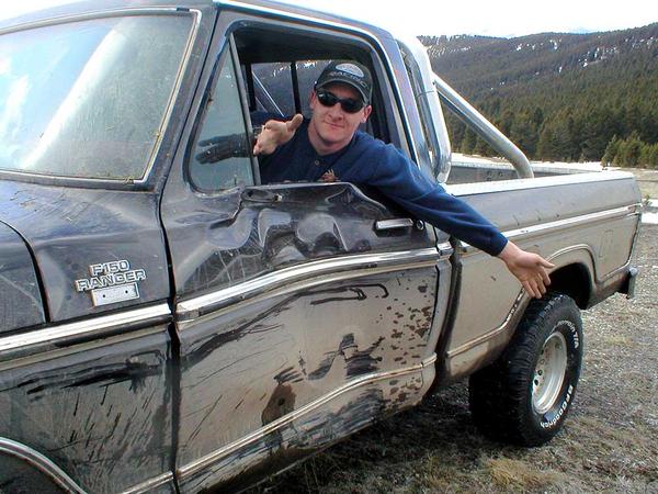 P3300042 - Uh oh, trail carnage.
Chris's door didn't fair too well while trying to kiss a tree.