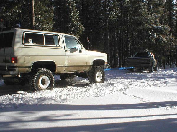 P3010124-Pulling Chris's rig out of his predicament.
Definitely a "2 truck" operation with all the ice under the snow