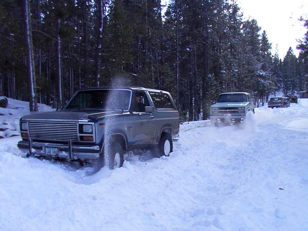 Trail Boss Doug Herold throwing some snow