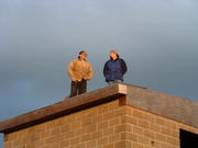 Mike Kelly and Doug Herold conversing on the roof.
