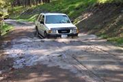 Ray follows through and takes the Isuzu for a swim.