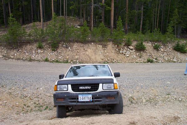 Ray tries to climb the gravel pile and gets hung up on his receiver hitch.  Oops.